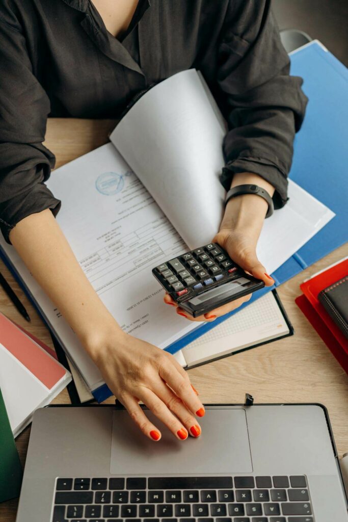 Woman working with a calculator